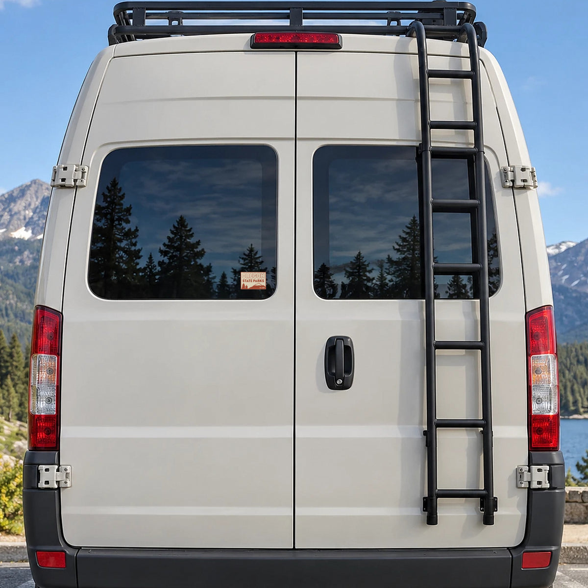 Retro Oregon State Parks sticker in the rear window of a camper van