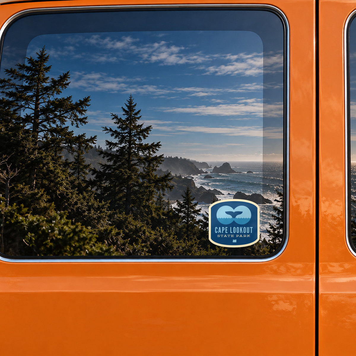 Cape Lookout sticker on the rear window of a van, reflecting a rocky coast with sea stacks